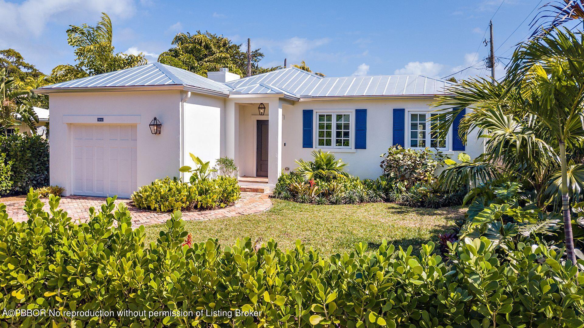 7610 Washington Road West Palm Beach, FL 33405 - Photo 12 of 12 a front view of a house with a yard
