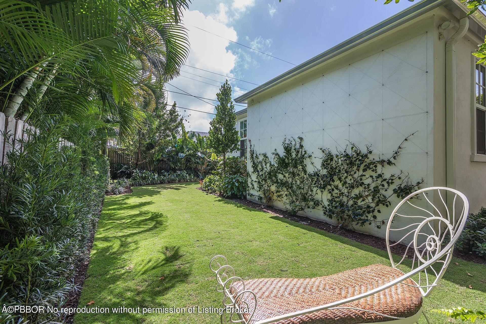 7610 Washington Road West Palm Beach, FL 33405 - Photo 10 of 12 a garden view with a seating space