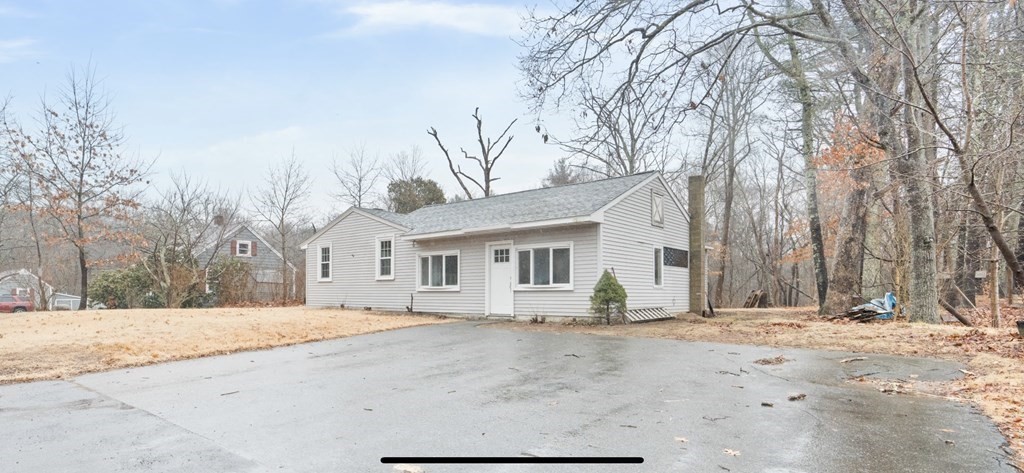 321 Winthrop Street Rehoboth, MA 02769 - Photo 1 of 16 a view of house with snow on the road