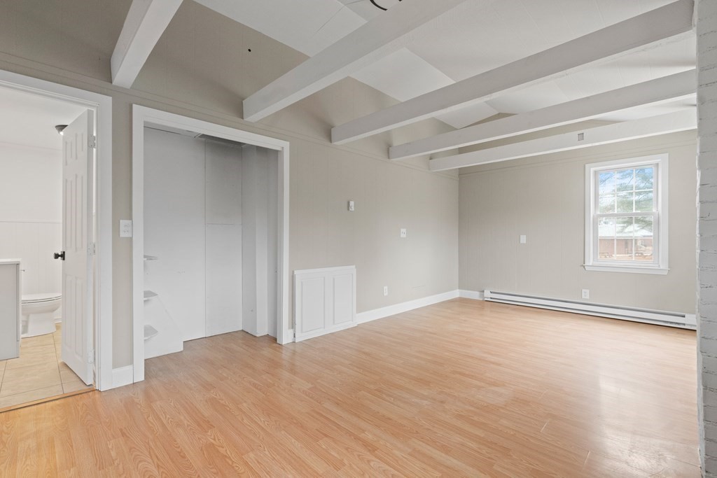 321 Winthrop Street Rehoboth, MA 02769 - Photo 13 of 16 a view of empty room with wooden floor