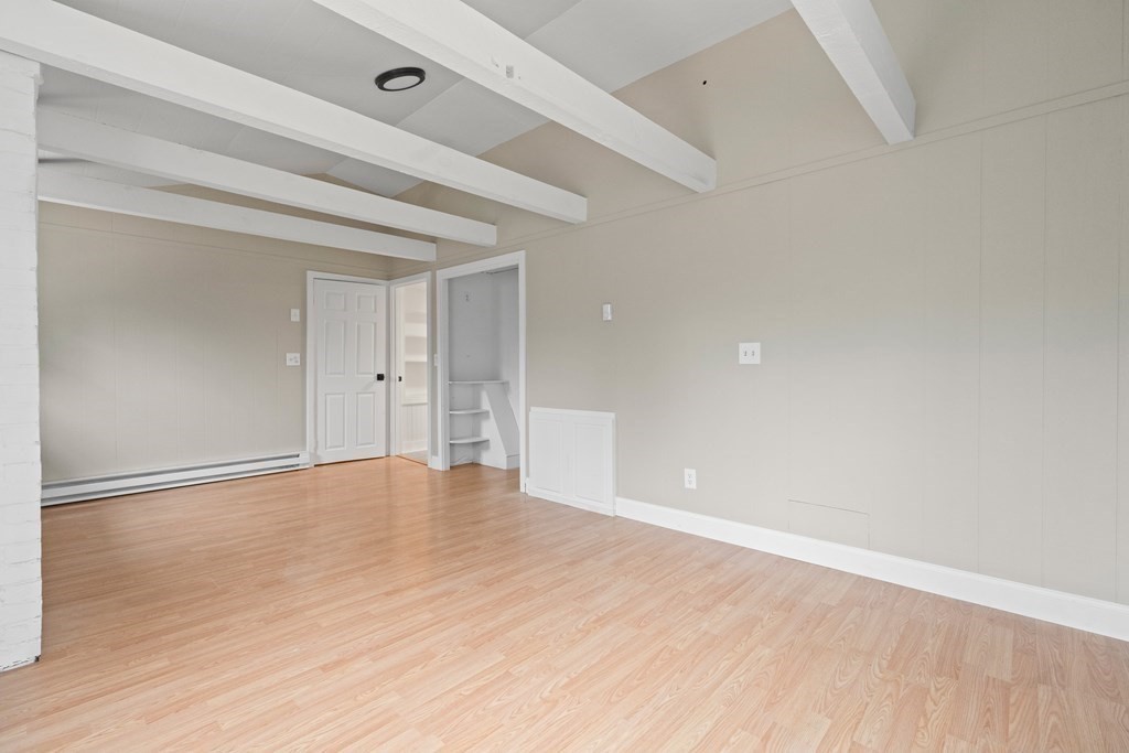 321 Winthrop Street Rehoboth, MA 02769 - Photo 14 of 16 a view of an empty room with wooden floor