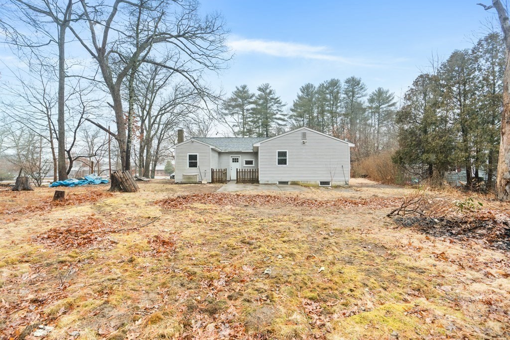 321 Winthrop Street Rehoboth, MA 02769 - Photo 3 of 16 a view of white house with a yard