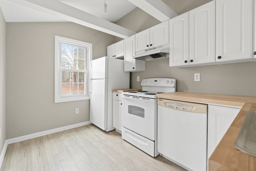 321 Winthrop Street Rehoboth, MA 02769 - Photo 5 of 16 a view of kitchen with furniture and wooden floor