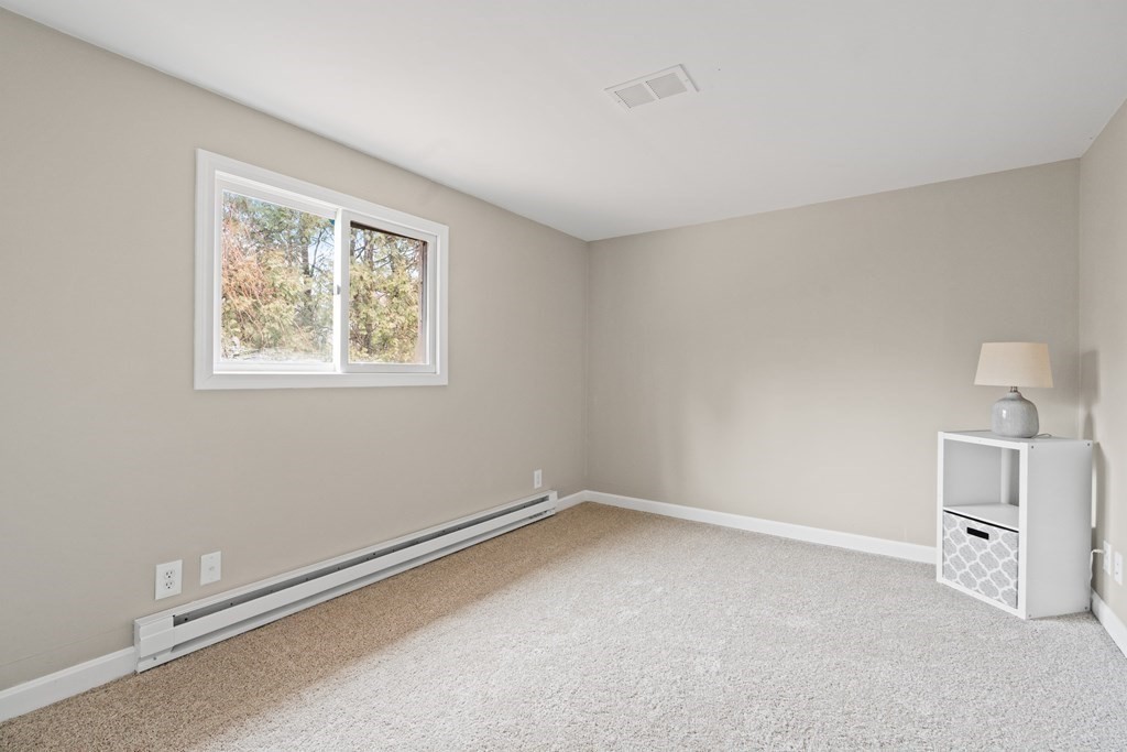 321 Winthrop Street Rehoboth, MA 02769 - Photo 10 of 16 a view of a room with air conditioner and a window