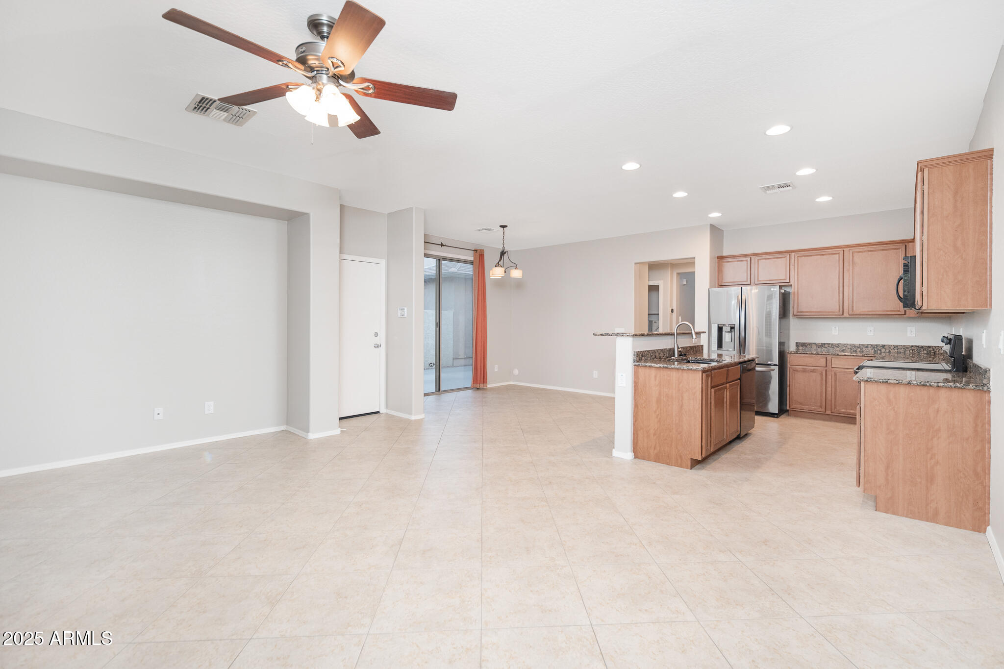 15345 West Wethersfield Road Surprise, AZ 85379 - Photo 9 of 37 09_Great-Room_03