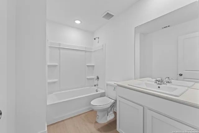 a view of a kitchen with a sink