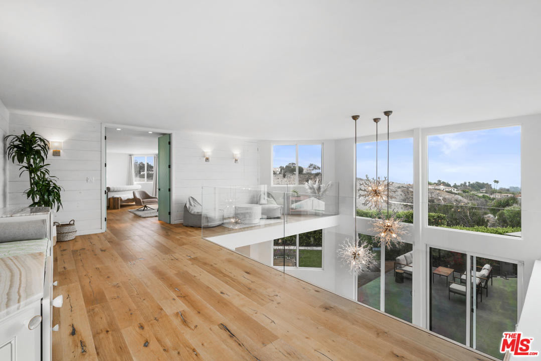 6272 Cavalleri Road Malibu, CA 90265 - Photo 16 of 47 a view of a living room and dining room