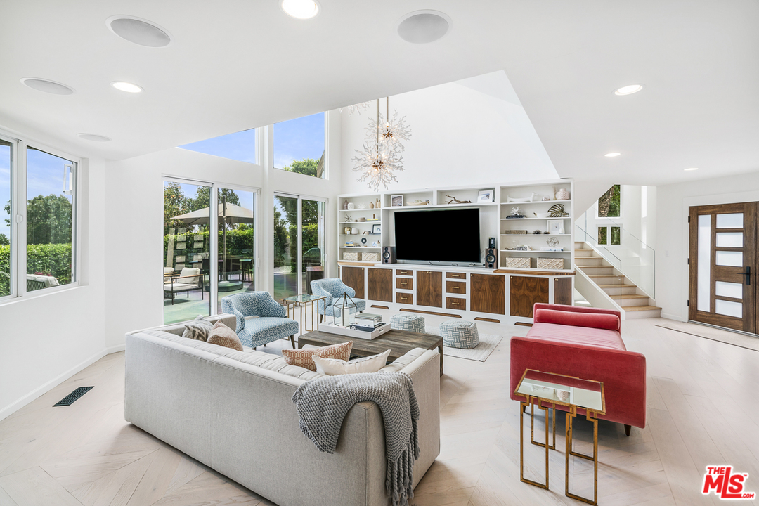 6272 Cavalleri Road Malibu, CA 90265 - Photo 5 of 47 a living room with furniture and flat screen tv