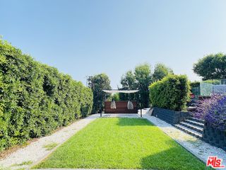 6272 Cavalleri Road Malibu, CA 90265 - Photo 45 of 47 a view of a swimming pool with a patio