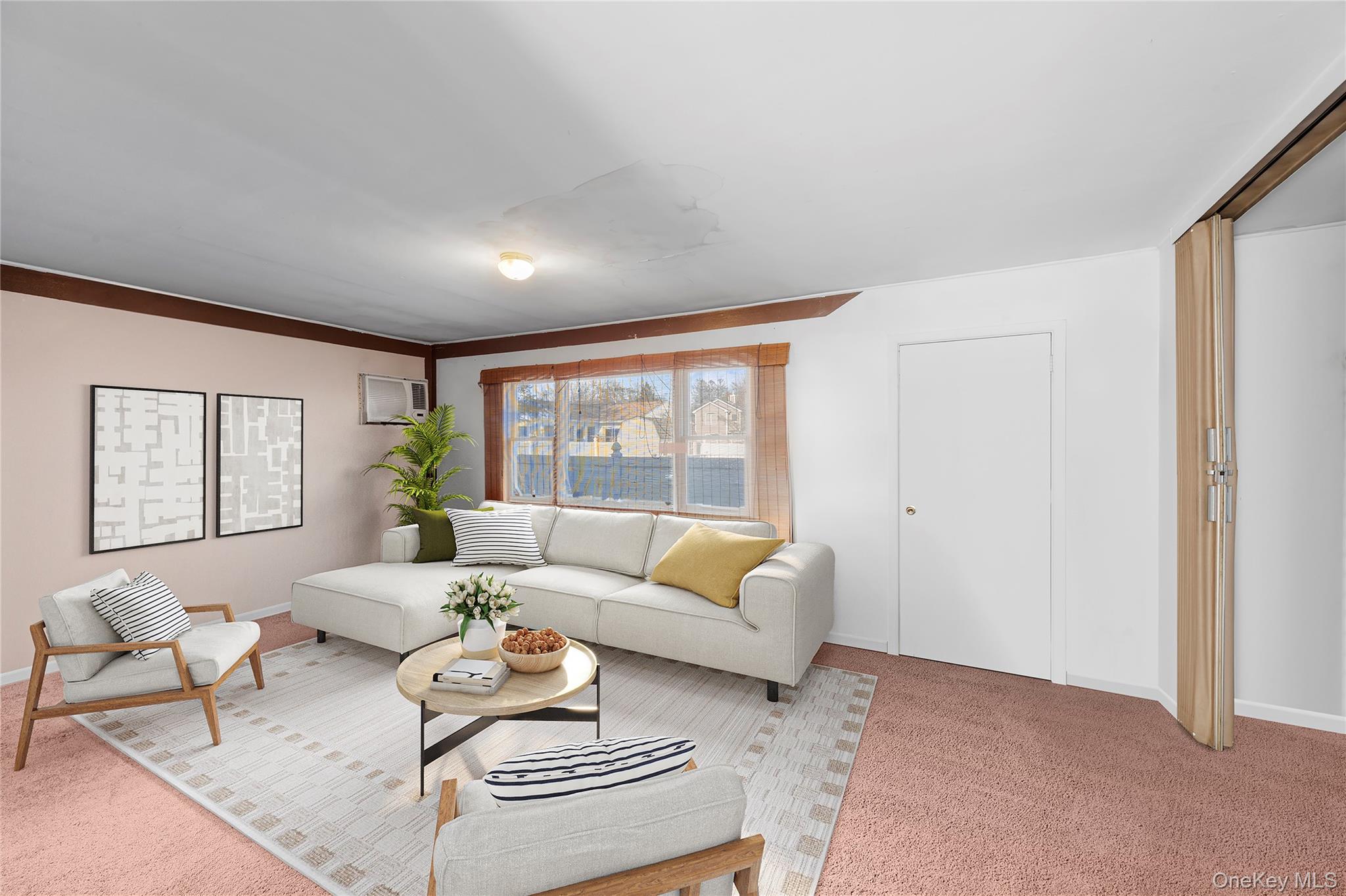 2 Kroll Street Plainview, NY 11803 - Photo 11 of 29 a living room with furniture and a large window