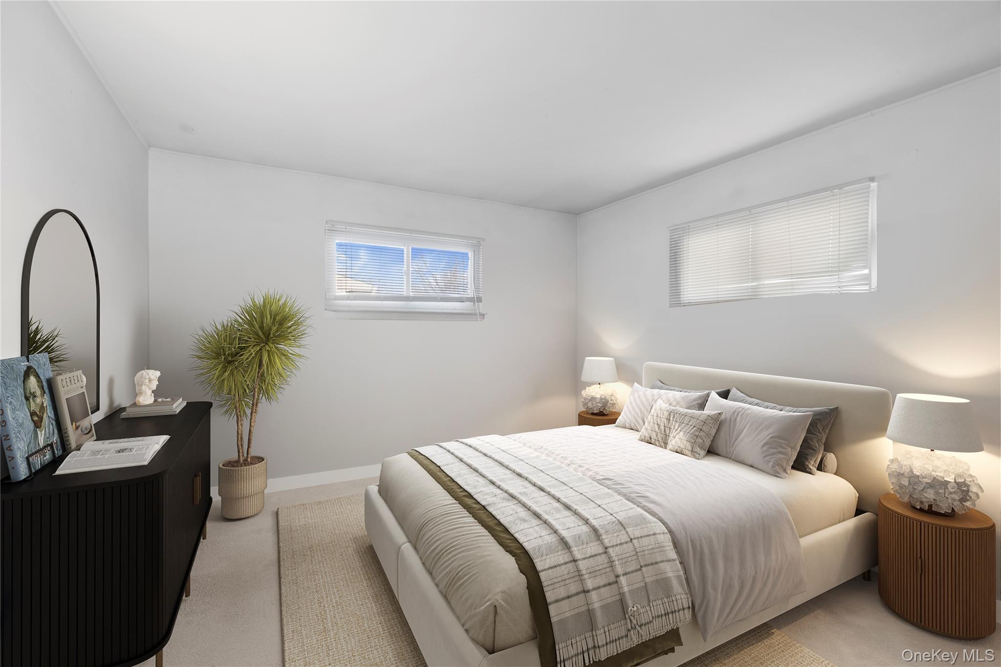 2 Kroll Street Plainview, NY 11803 - Photo 16 of 29 a bedroom with a bed and a potted plant