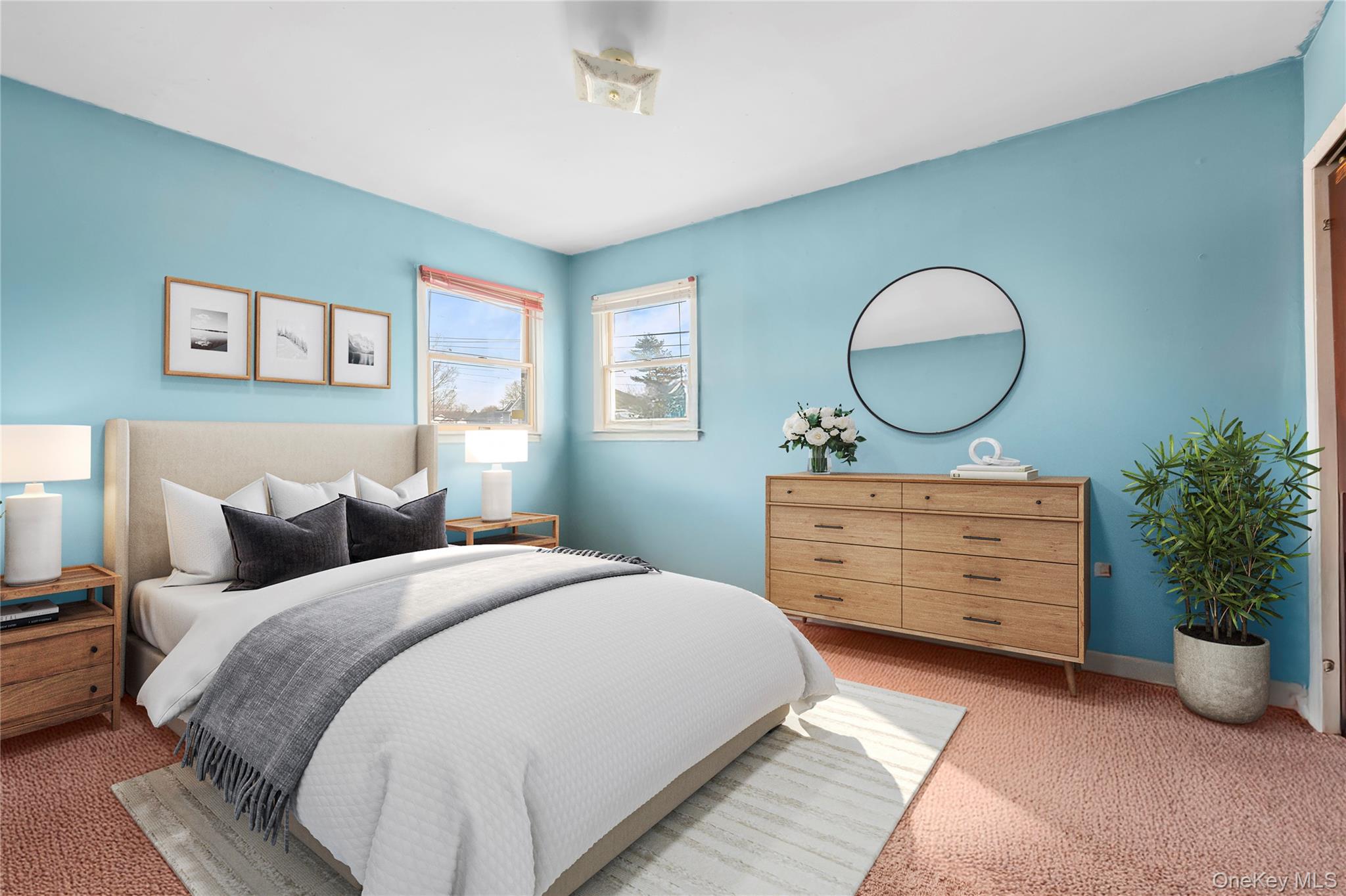 2 Kroll Street Plainview, NY 11803 - Photo 19 of 29 a bedroom with a bed and a dresser