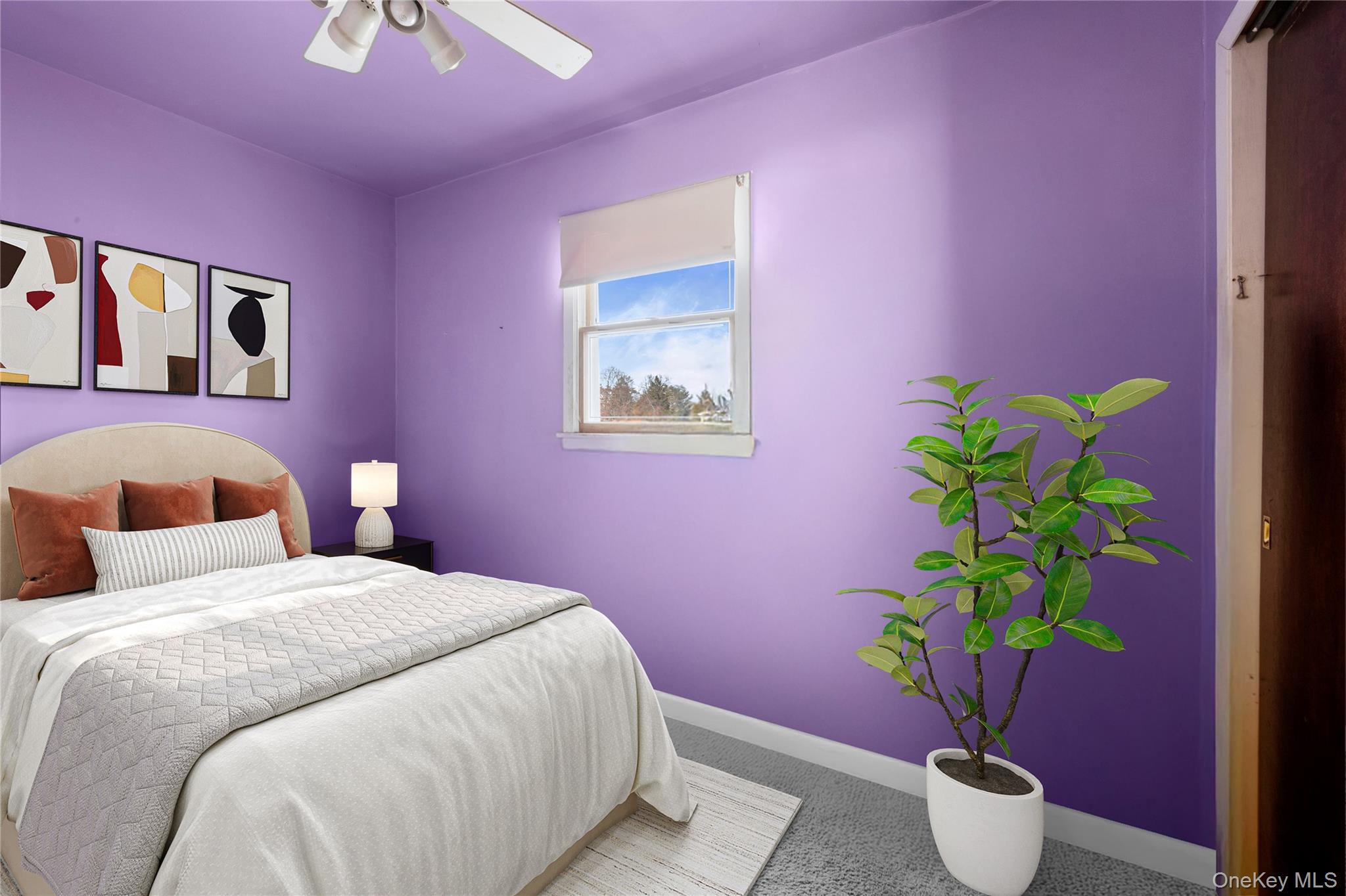 2 Kroll Street Plainview, NY 11803 - Photo 20 of 29 a bedroom with a bed and a potted plant