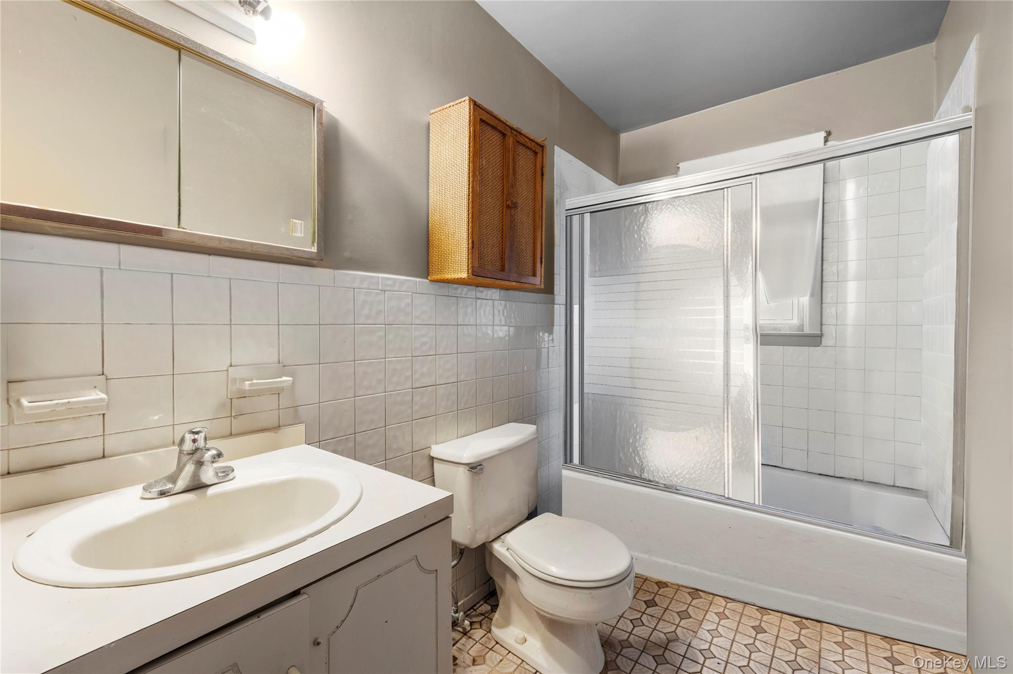 2 Kroll Street Plainview, NY 11803 - Photo 21 of 29 a bathroom with a sink toilet and shower