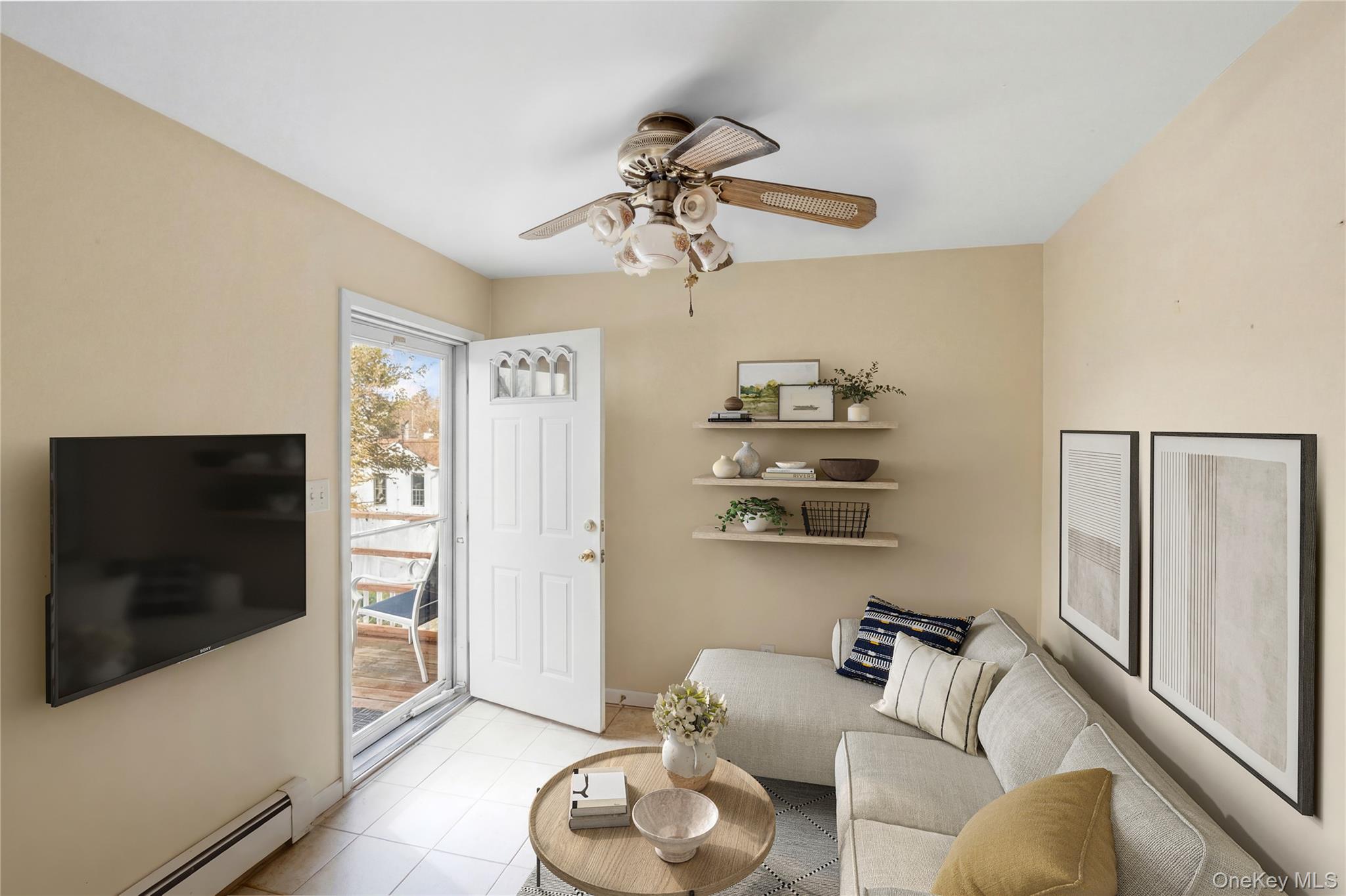 2 Kroll Street Plainview, NY 11803 - Photo 25 of 29 a living room with furniture and a flat screen tv