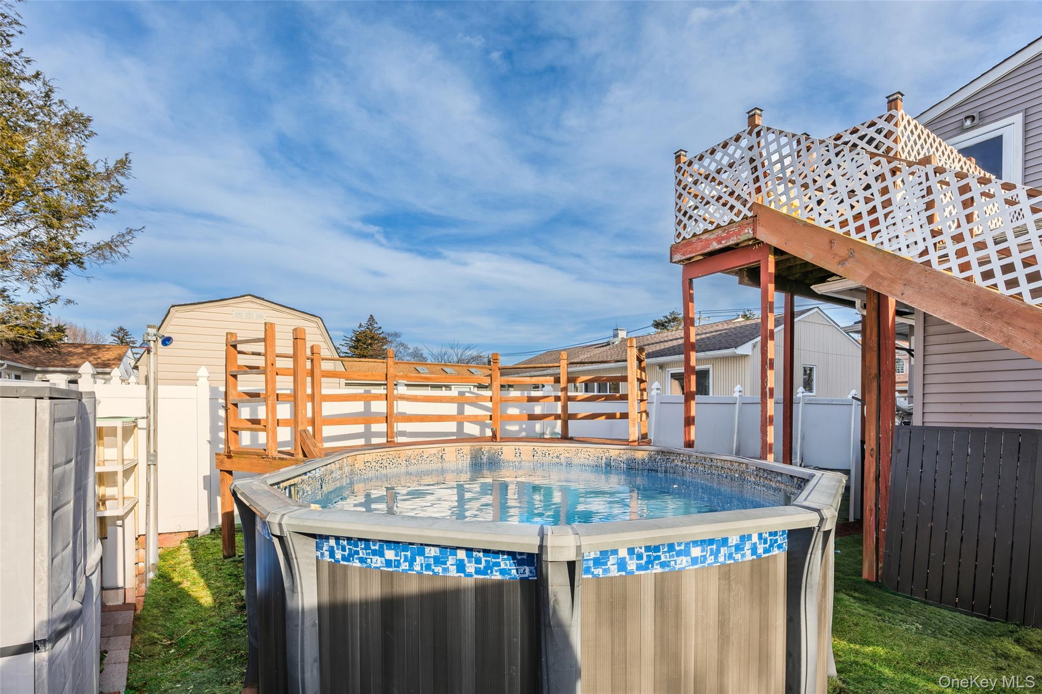 2 Kroll Street Plainview, NY 11803 - Photo 8 of 29 a view of swimming pool with an outdoor seating