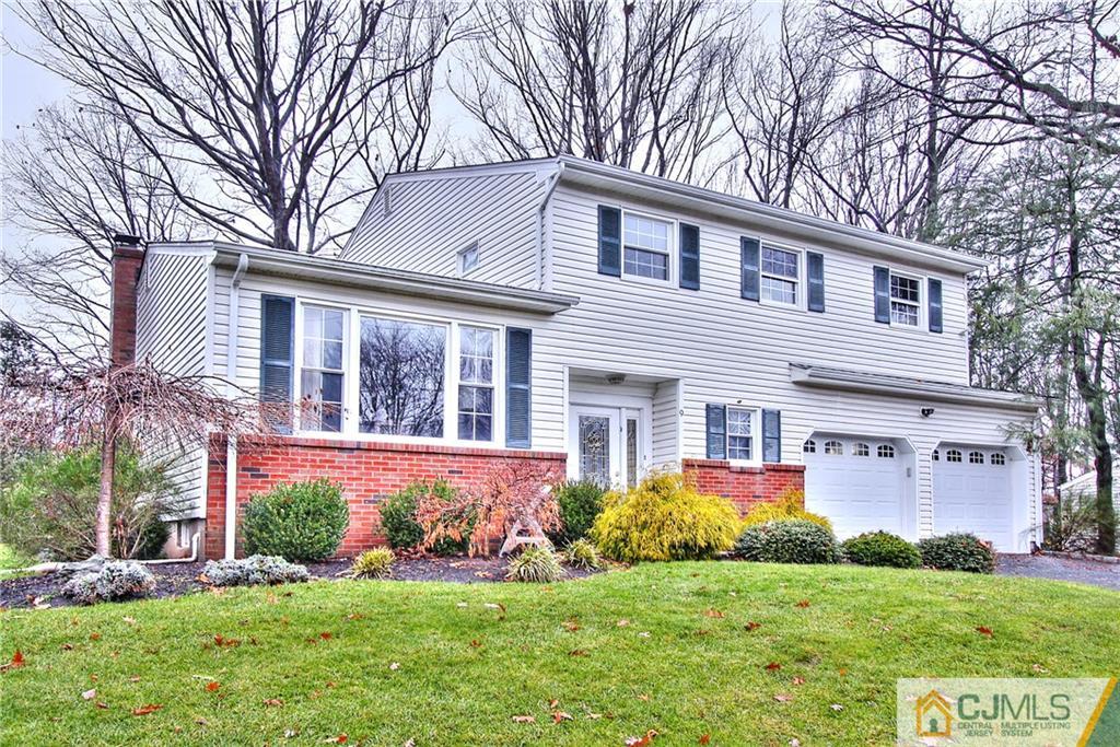 9 Cardinal Avenue Edison, NJ 08820 - Photo 1 of 20 a front view of house with yard and green space