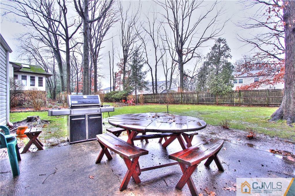 9 Cardinal Avenue Edison, NJ 08820 - Photo 18 of 20 a table and chairs in the garden