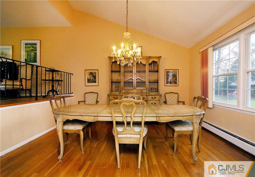 9 Cardinal Avenue Edison, NJ 08820 - Photo 6 of 20 a view of a dining room with furniture and wooden floor