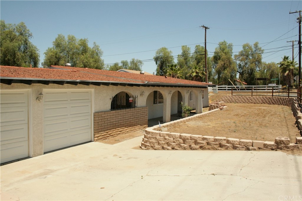 16761 Washington Street Riverside, CA 92504 - Photo 1 of 1 a view of a house with a outdoor space