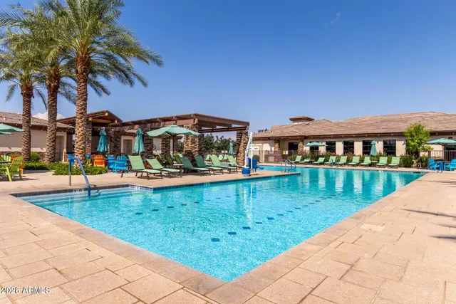 a view of swimming pool with a garden
