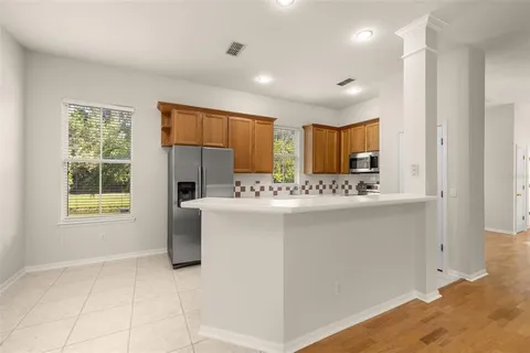 a bathroom with a sink a vanity and a mirror
