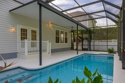 a view of a house with a swimming pool