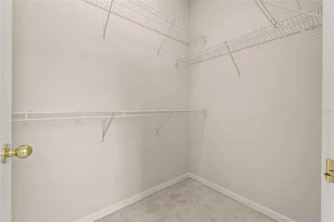 a bathroom with a sink a mirror and a shower