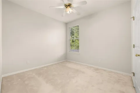 a view of a golf course with a lake