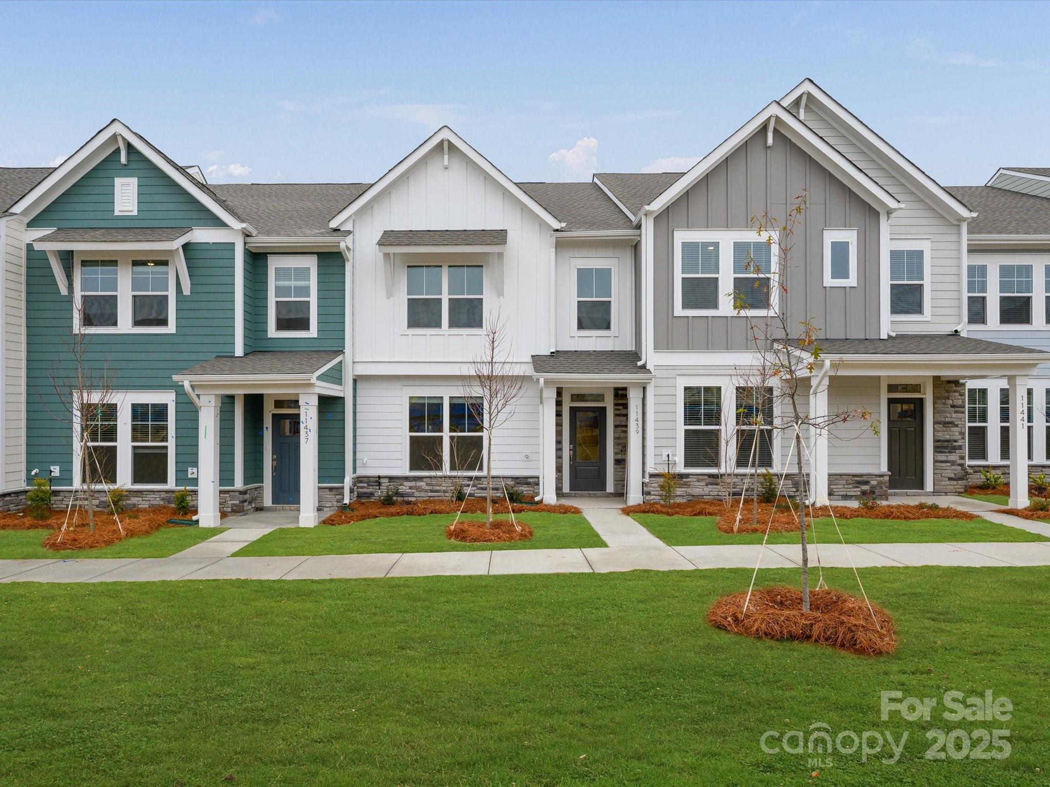 11439 Prosperity Church Road Huntersville, NC 28078 - Photo 1 of 34 a front view of a house with a yard