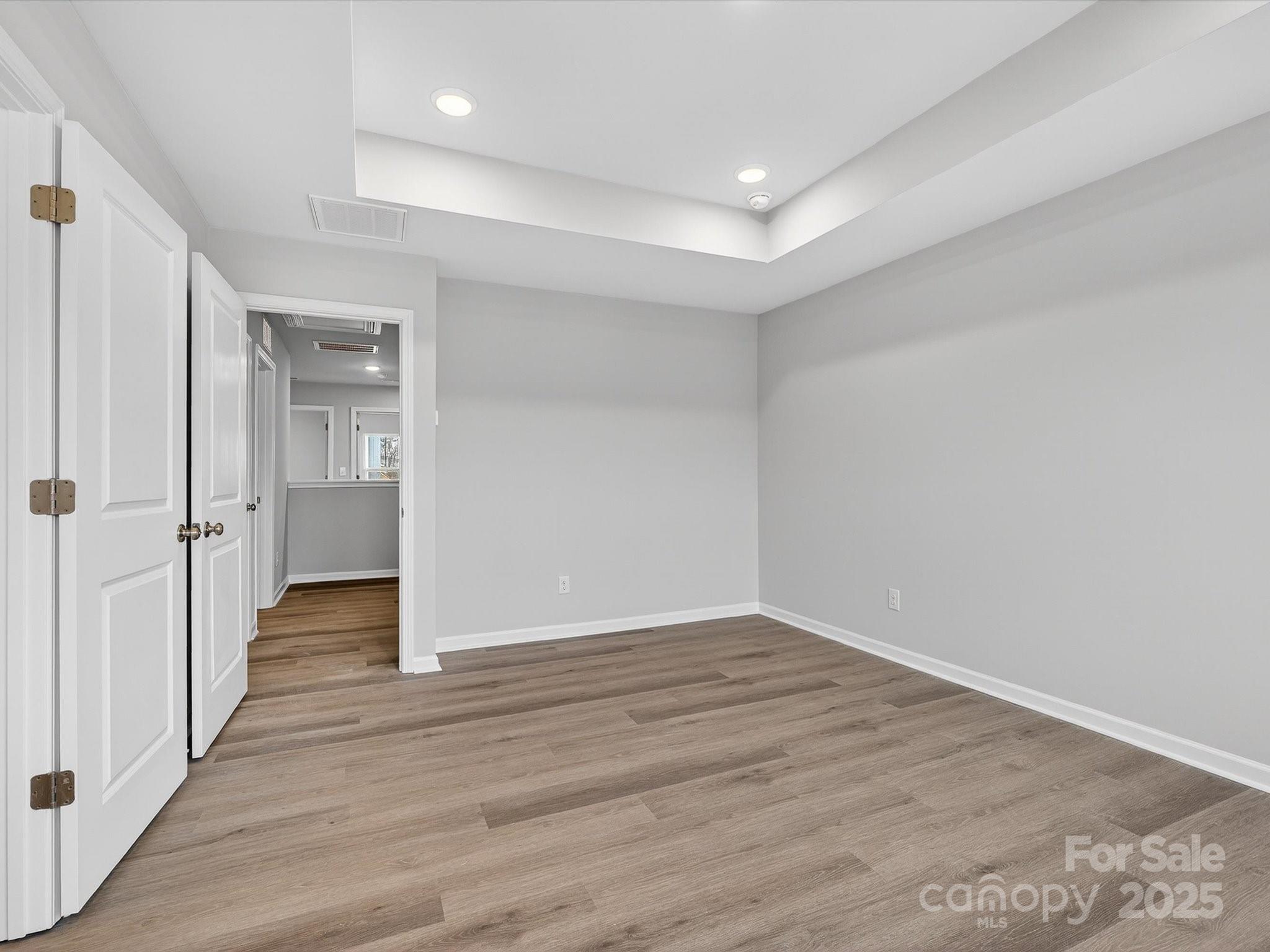 11439 Prosperity Church Road Huntersville, NC 28078 - Photo 20 of 34 a view of a hallway with wooden floor