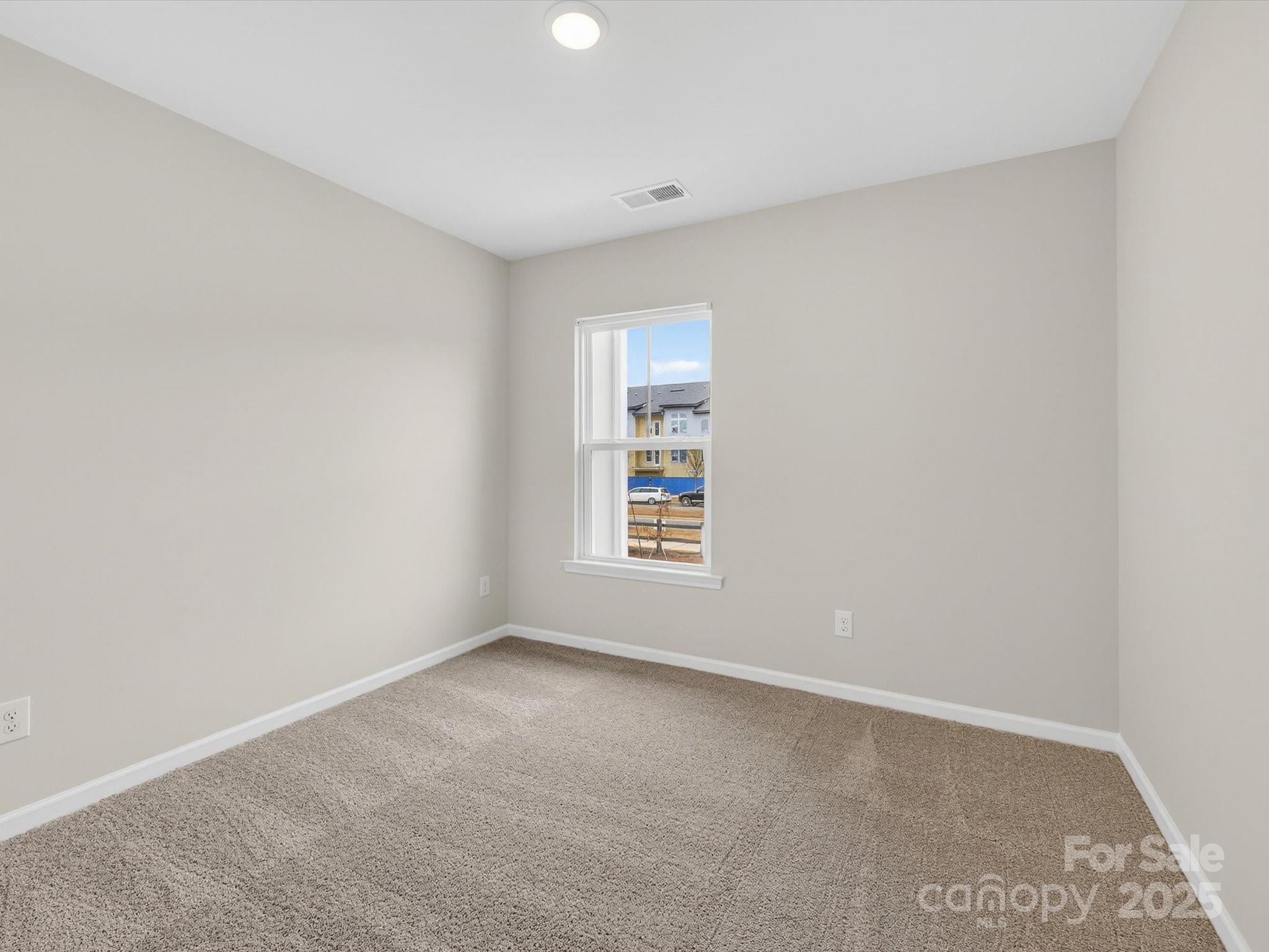 11439 Prosperity Church Road Huntersville, NC 28078 - Photo 24 of 34 an empty room with a window