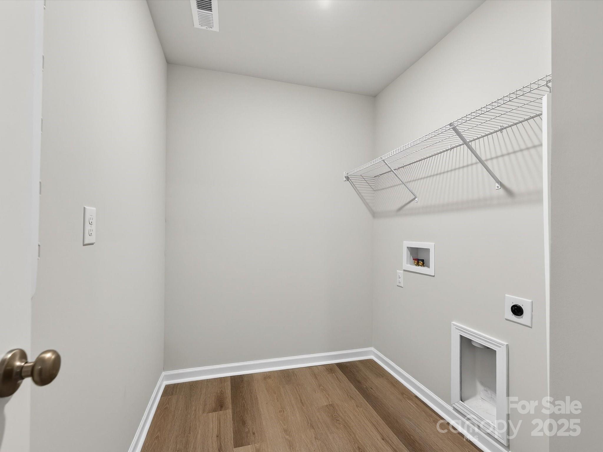 11439 Prosperity Church Road Huntersville, NC 28078 - Photo 26 of 34 a view of a room with rack on the wall