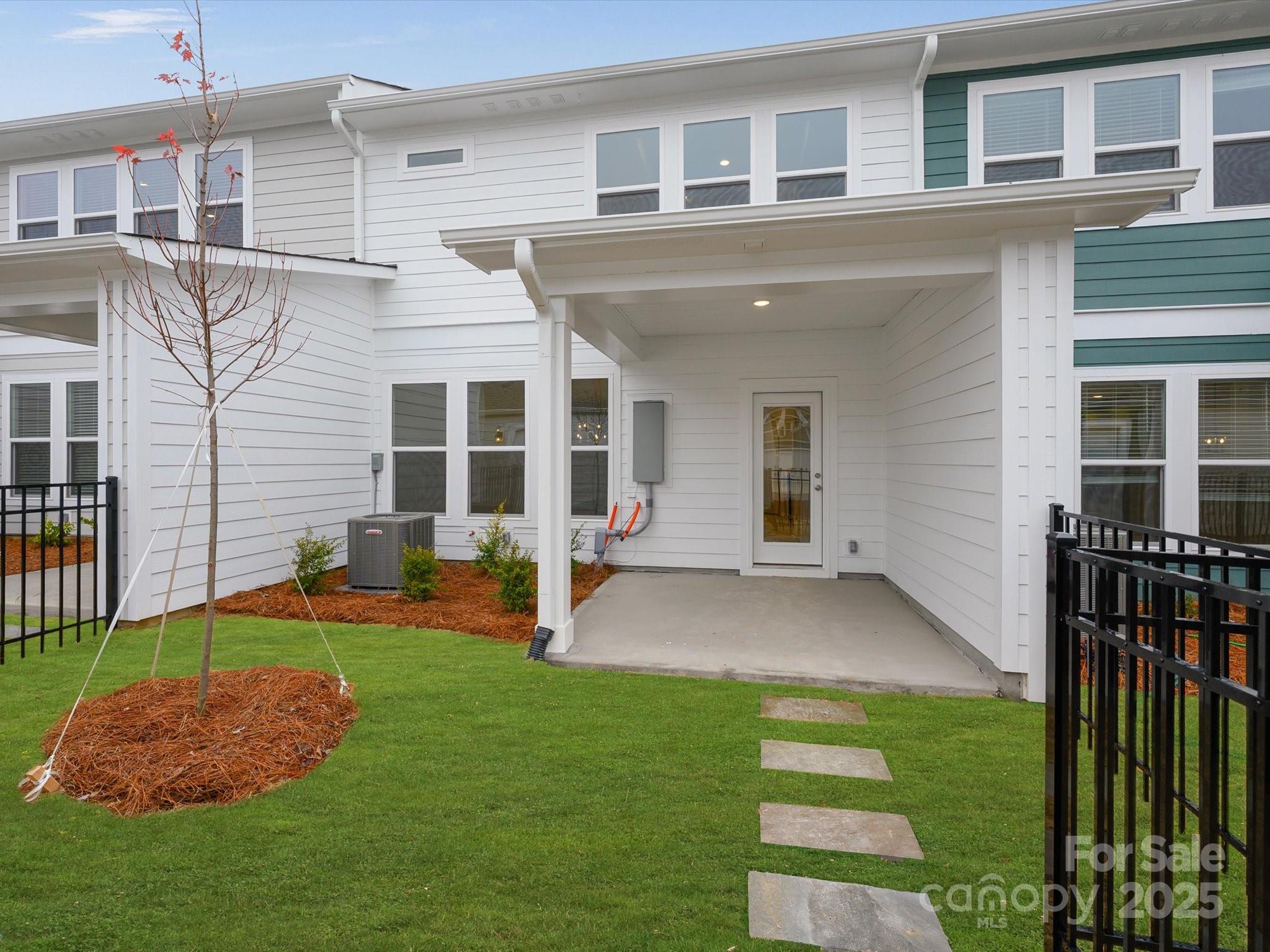 11439 Prosperity Church Road Huntersville, NC 28078 - Photo 28 of 34 a front view of a house with a yard