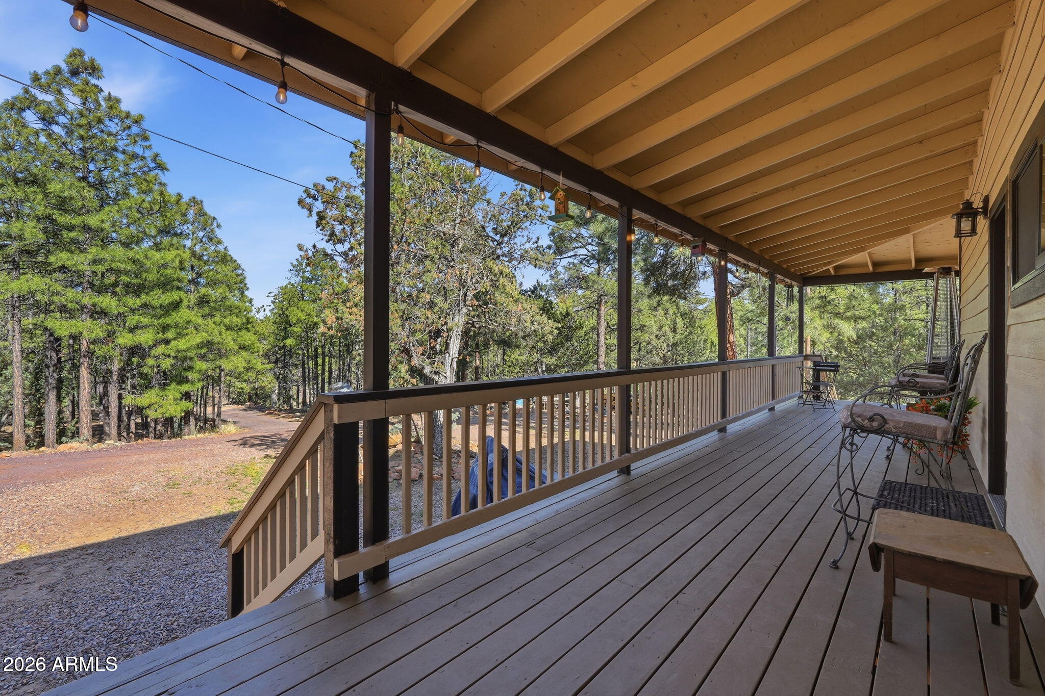 2060 Gilbert Lane Overgaard, AZ 85933 - Photo 17 of 87 a view of balcony with wooden floor