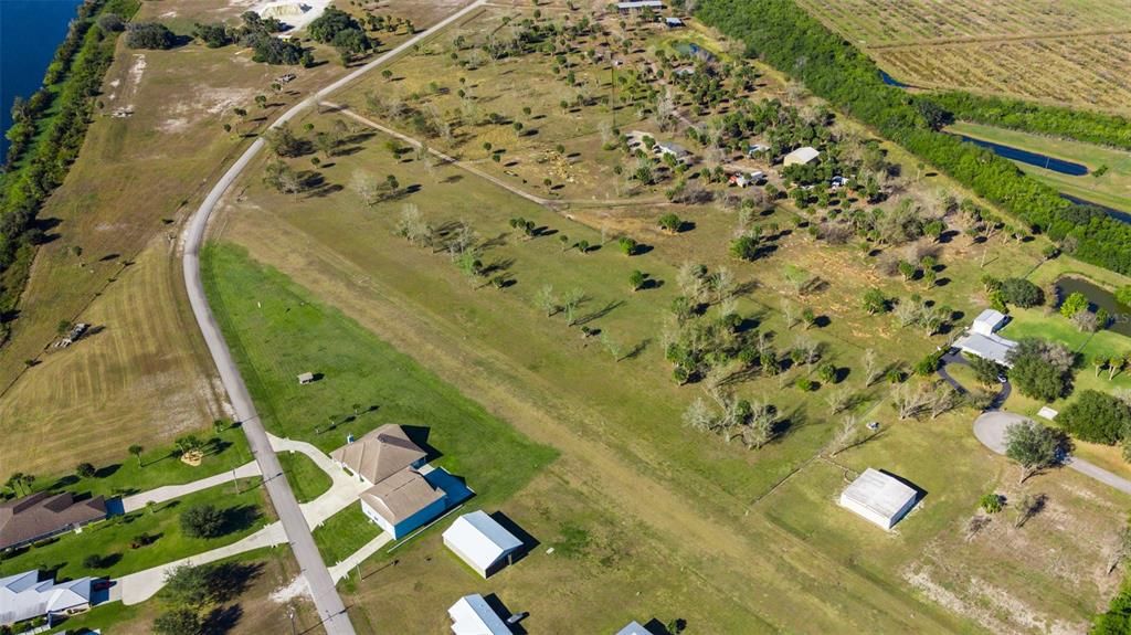 Southwest 144th Parkway Okeechobee, FL 34974 - Photo 19 of 27 view of a pool with a yard