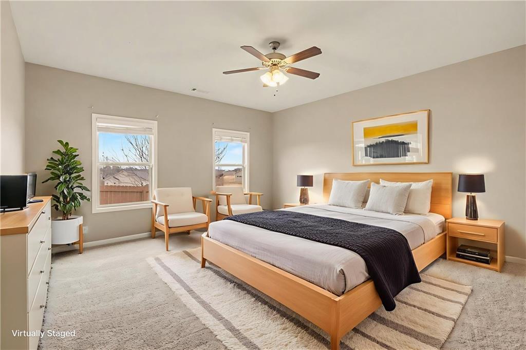 4475 Clubside Drive Gainesville, GA 30504 - Photo 16 of 36 a bedroom with a large bed and potted plant