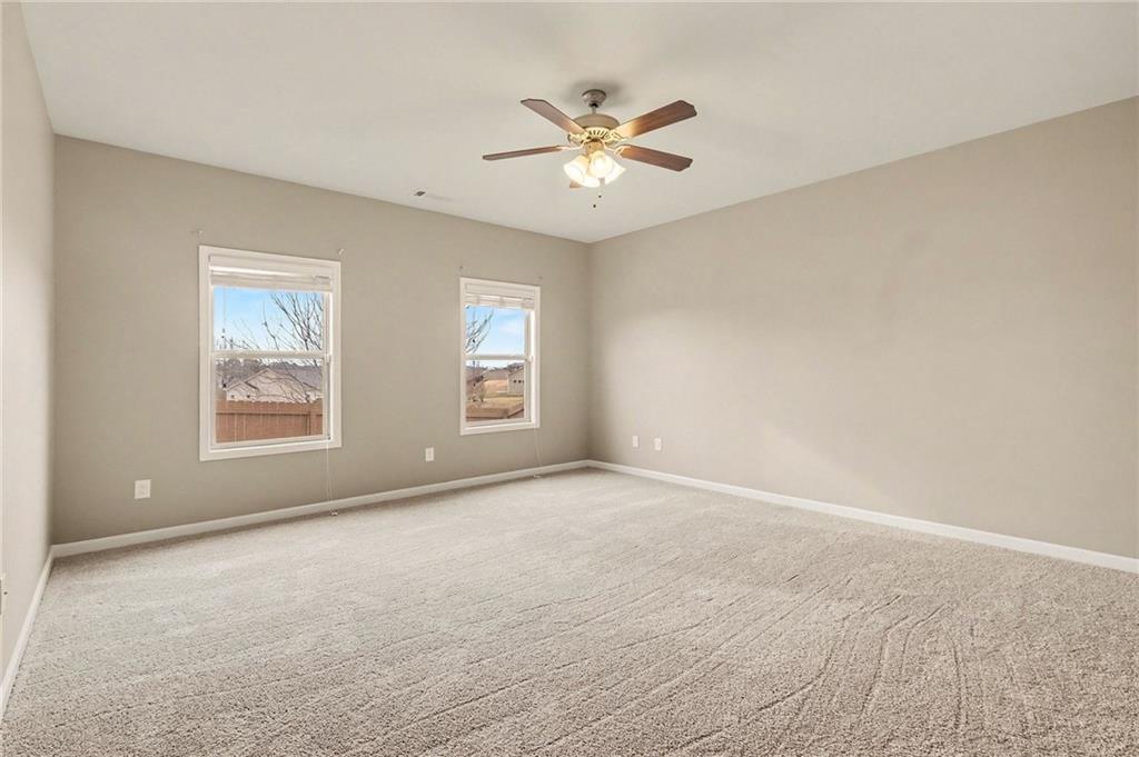 4475 Clubside Drive Gainesville, GA 30504 - Photo 18 of 36 a view of an empty room with a window
