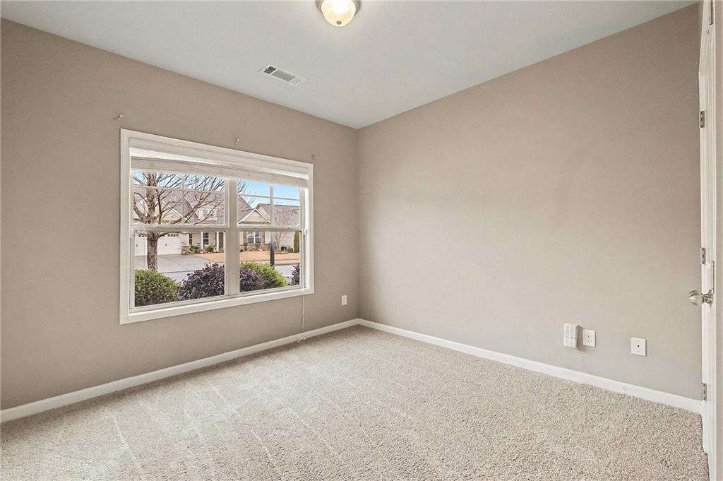 4475 Clubside Drive Gainesville, GA 30504 - Photo 20 of 36 an empty room with windows