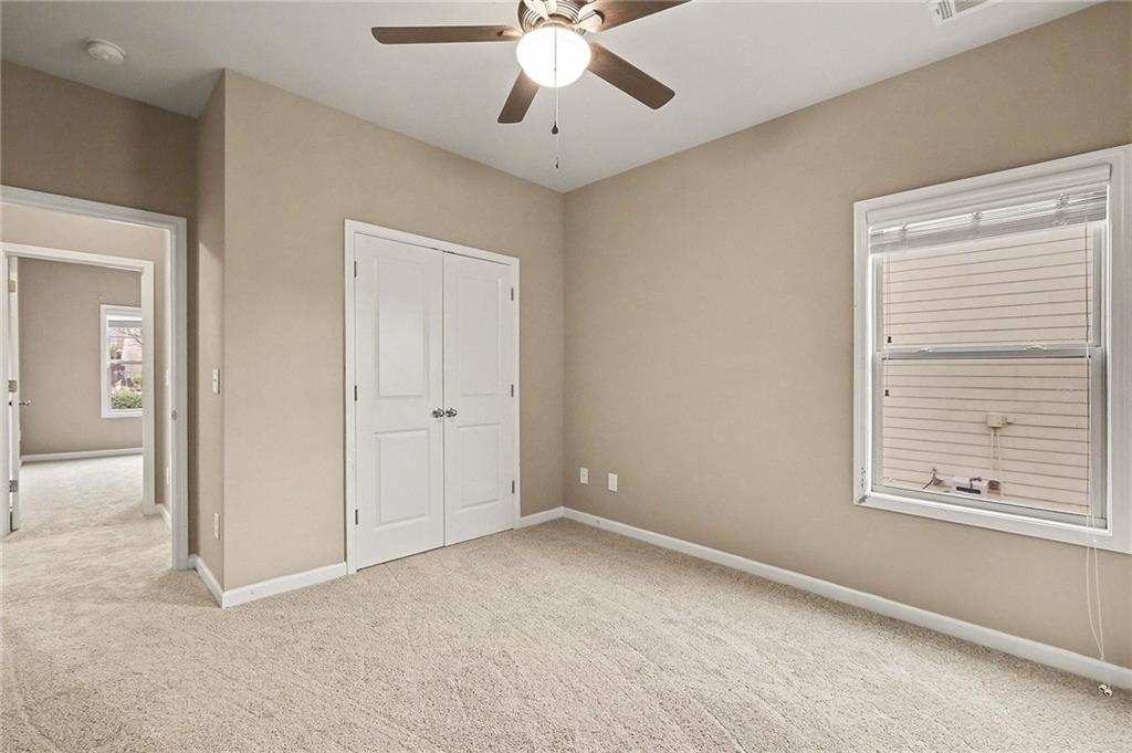 4475 Clubside Drive Gainesville, GA 30504 - Photo 21 of 36 a view of an empty room with a window