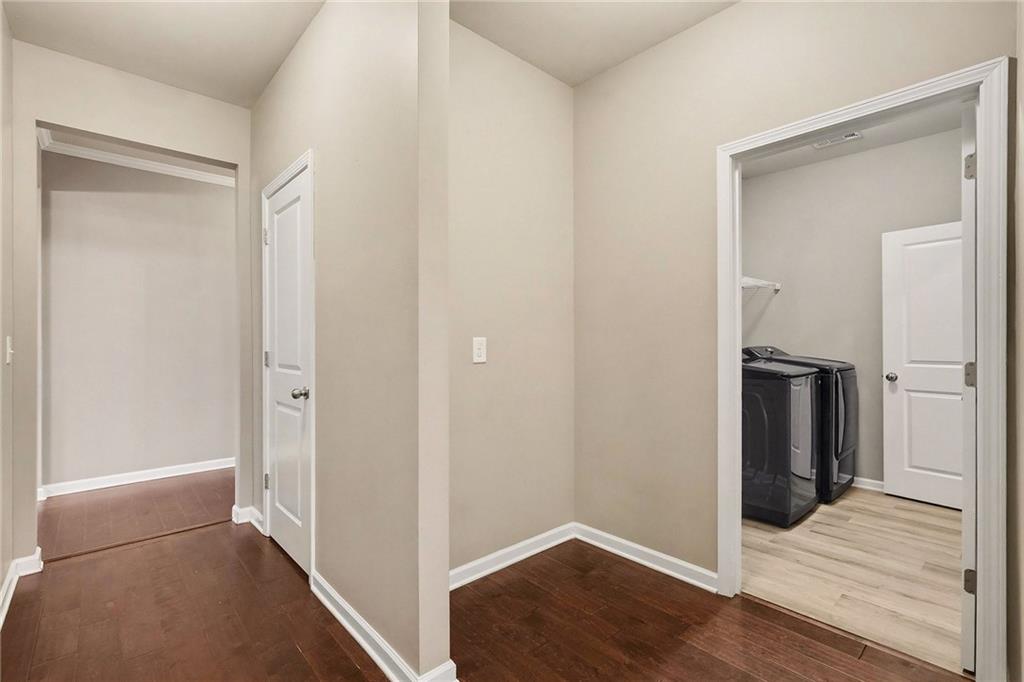 4475 Clubside Drive Gainesville, GA 30504 - Photo 29 of 36 a view of a hallway with wooden floor