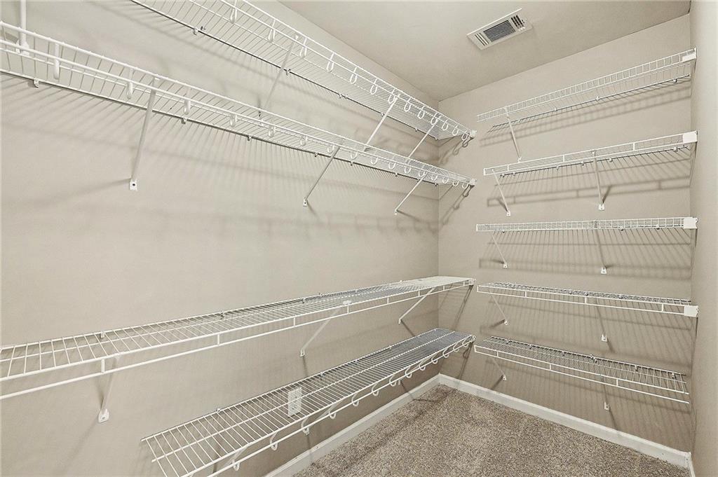 4475 Clubside Drive Gainesville, GA 30504 - Photo 31 of 36 a view of a room with racks on the wall