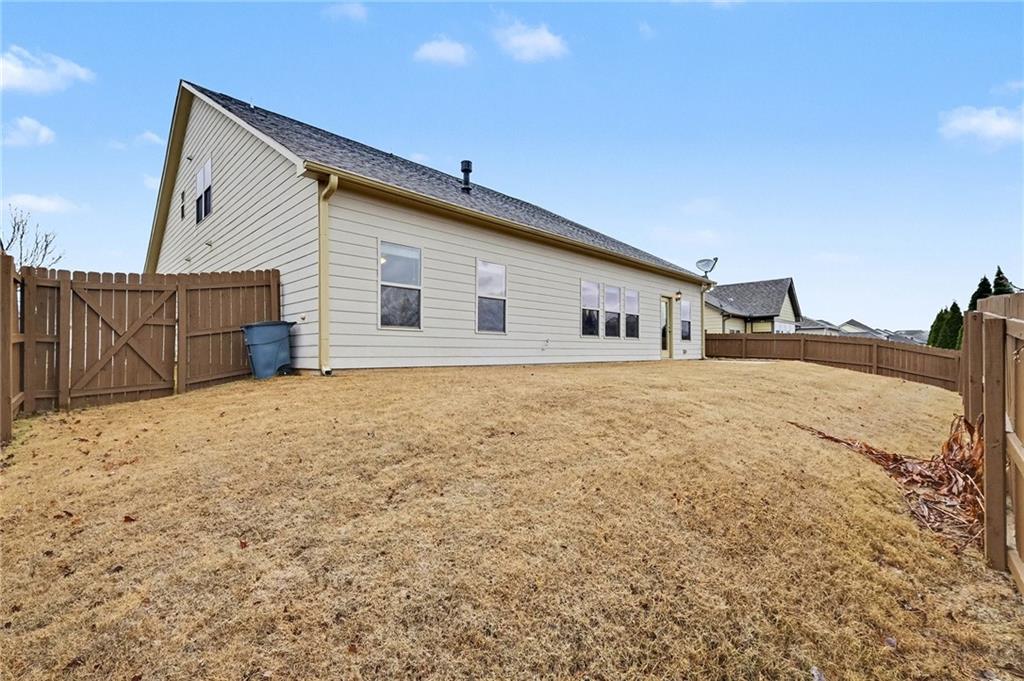 4475 Clubside Drive Gainesville, GA 30504 - Photo 35 of 36 a view of house with backyard and trees