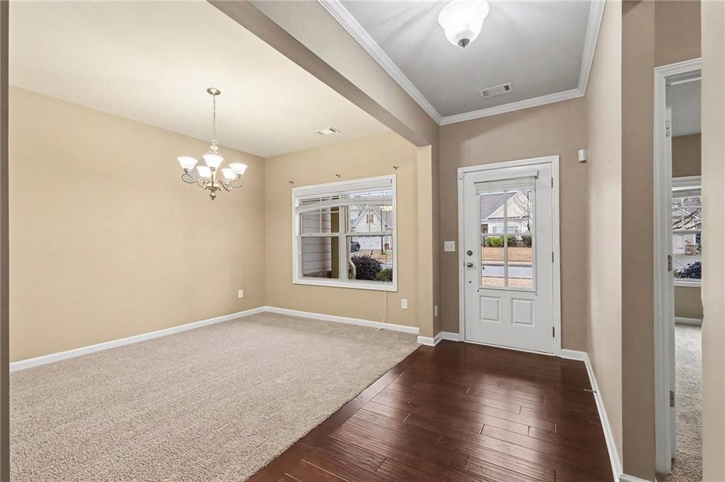 4475 Clubside Drive Gainesville, GA 30504 - Photo 5 of 36 wooden floor in an empty room with a window