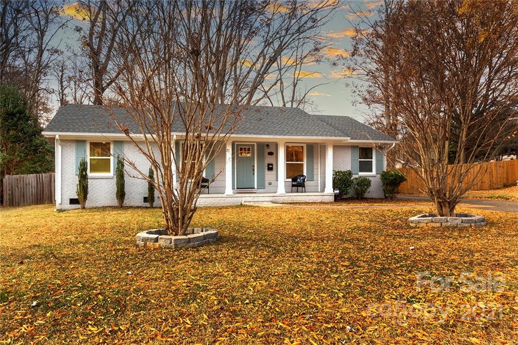 5110 Auburndale Road Charlotte, NC 28205 - Photo 1 of 30 a front view of a house with a yard