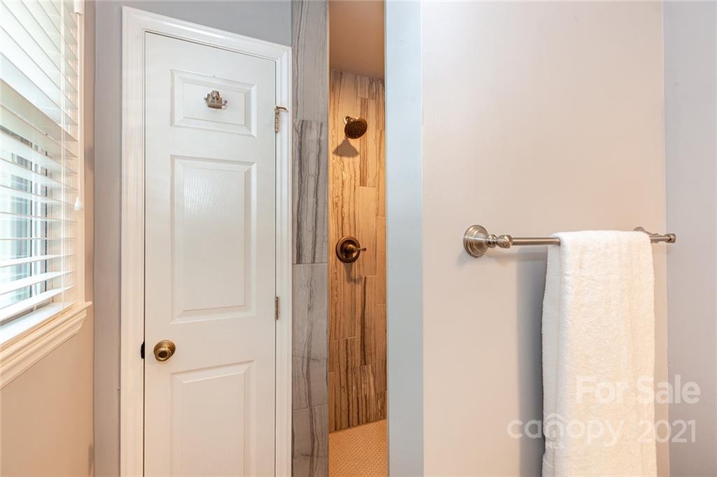 5110 Auburndale Road Charlotte, NC 28205 - Photo 17 of 30 a bathroom with a shower