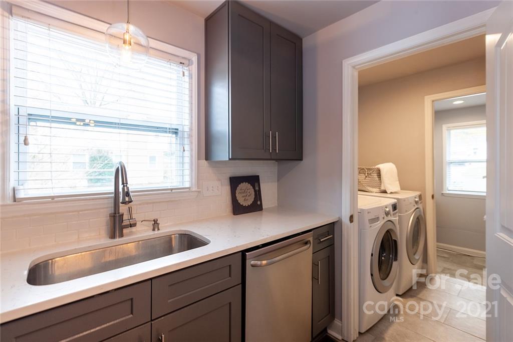 5110 Auburndale Road Charlotte, NC 28205 - Photo 9 of 30 a utility room with sink dryer and washer