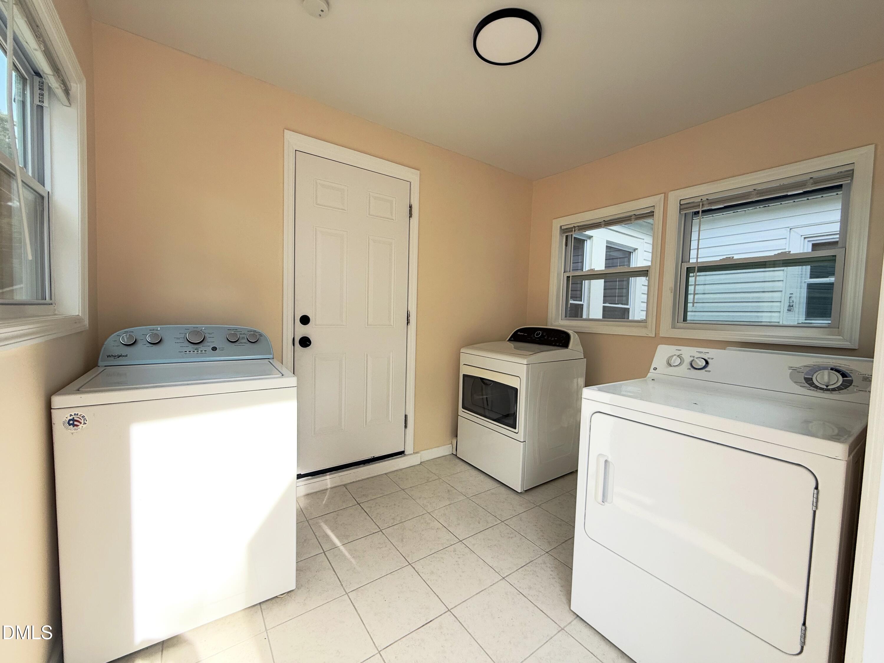 417 North Street Graham, NC 27253 - Photo 8 of 18 a utility room with dryer and washer