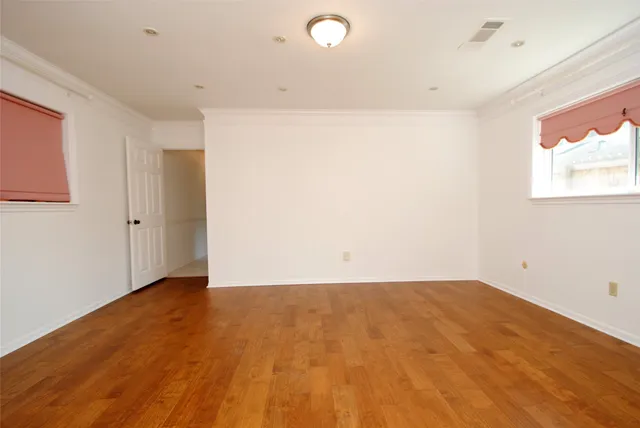 a bathroom with a sink toilet a mirror and shower