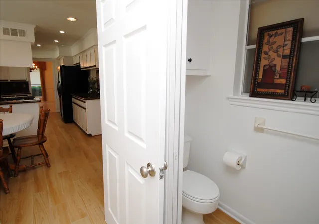 a view of a patio with couches and potted plants